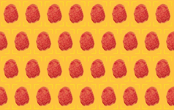 Red fingerprints on yellow background