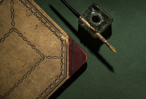 Antique ink well and pen