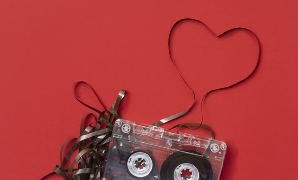 Analog audio cassette on red background