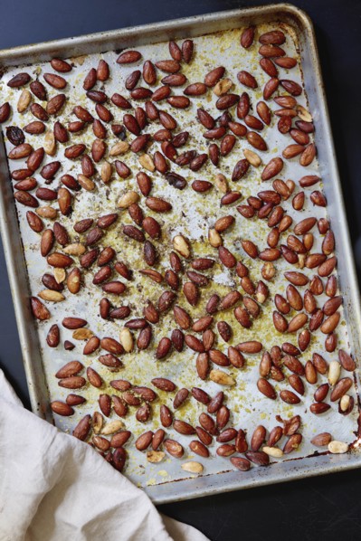 Roasted almonds on baking sheet