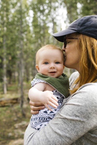Woman kissing baby son