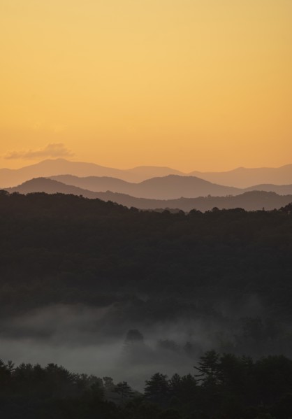 USA, Georgia, Orange sky above Blue Ridge Mountains at sunrise