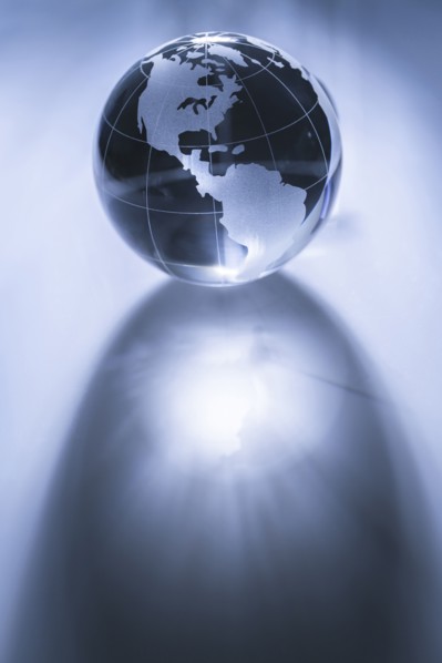 Glass globe on gray background