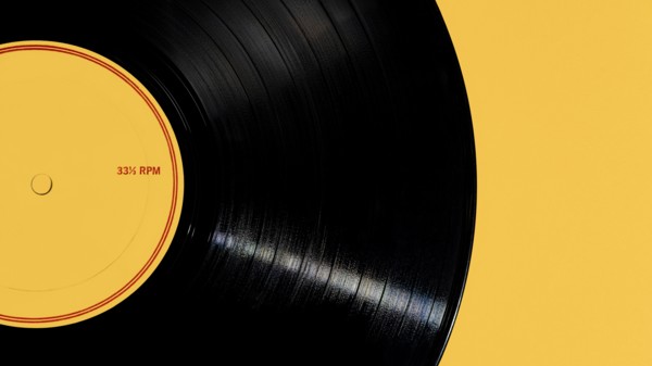 Vintage record on yellow background