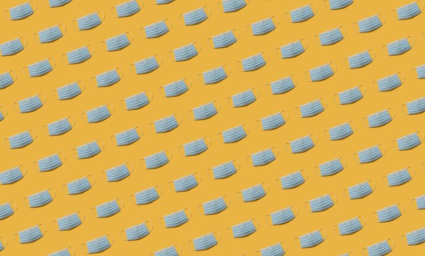 Flu masks on orange background
