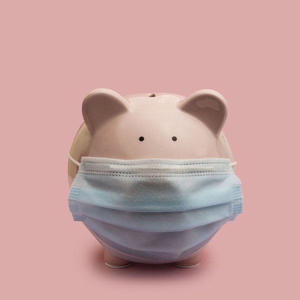 Piggy bank with flu mask