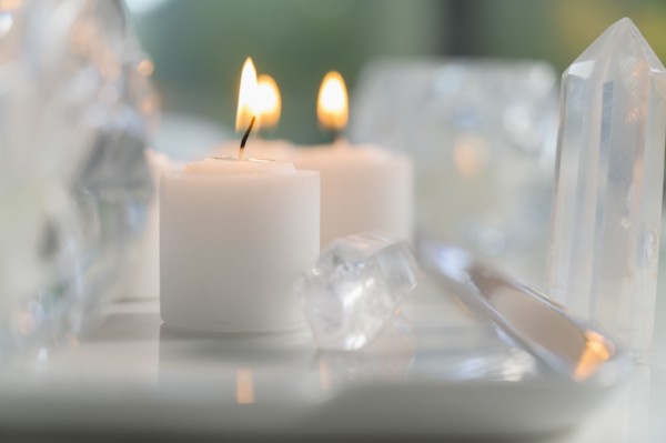 Composition of burning candles and crystals