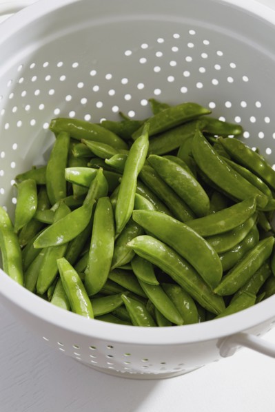Green peas in colander