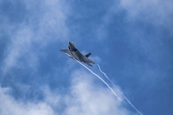 Lockheed Martin F-22 Raptor flying against sky