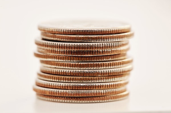 Stack of coins on white background