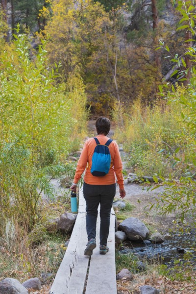 Woman hiking in Bandelier National Monument