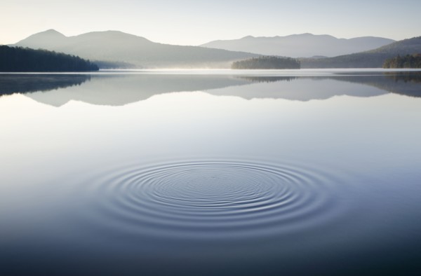 Ripples on calm lake surface