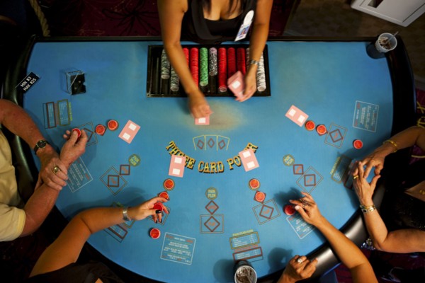 People playing poker in casino