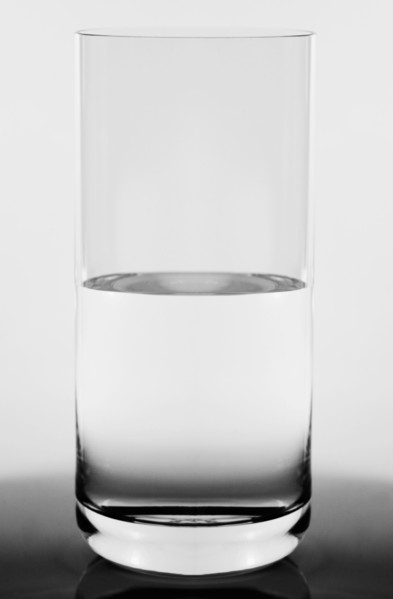 Studio shot of  glass half full concept