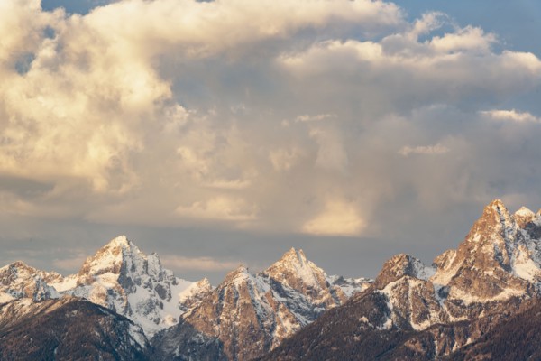 Snow covered Teton mountains at sunrise