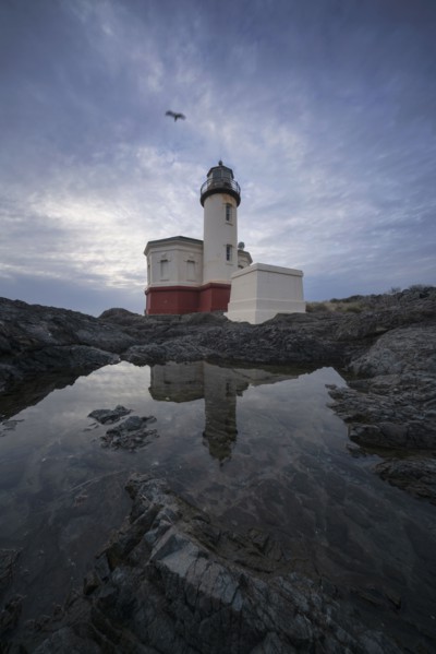 Coquille River Lighthouse reflecting in water