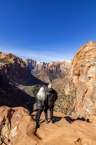 Senior couple looking over Zion Canyon in Zion National Park