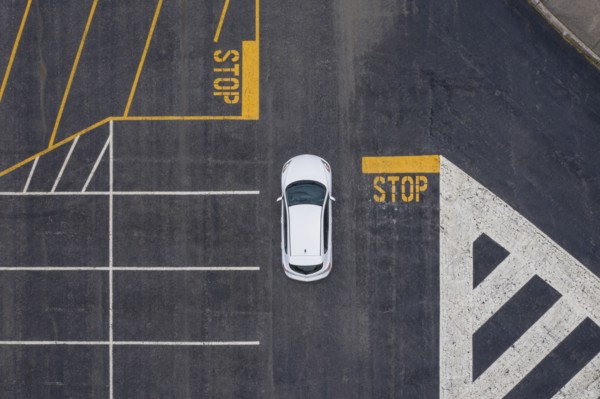 Aerial view of car in parking lot