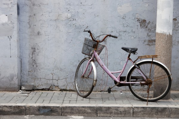 Old bicycle on village street