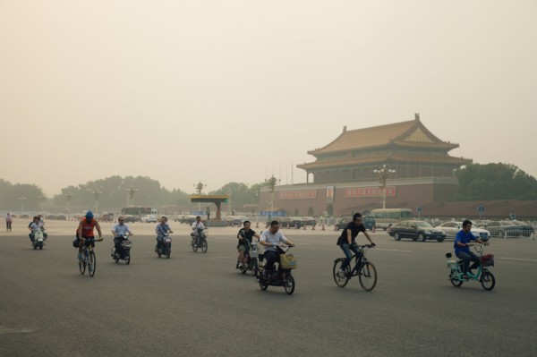 People bicycling in Tiananman Square