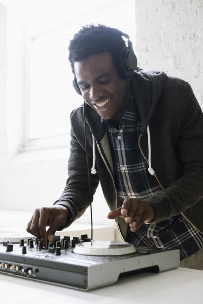DJ using mixing desk