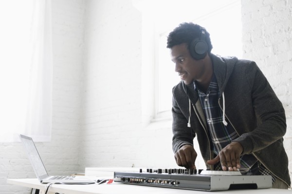 DJ using mixing desk