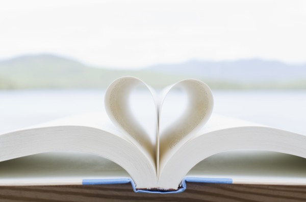 Book pages folded in heart shape