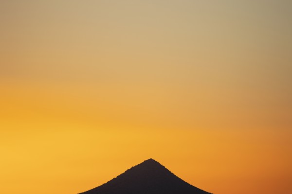 Sunset sky over peak in Cerrillos Hills State Park