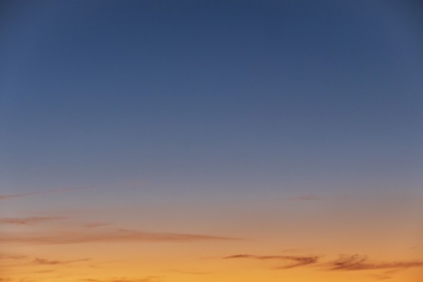 Blue and yellow sunset sky