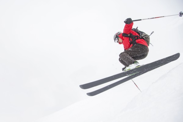 Skier jumping on snowy slope