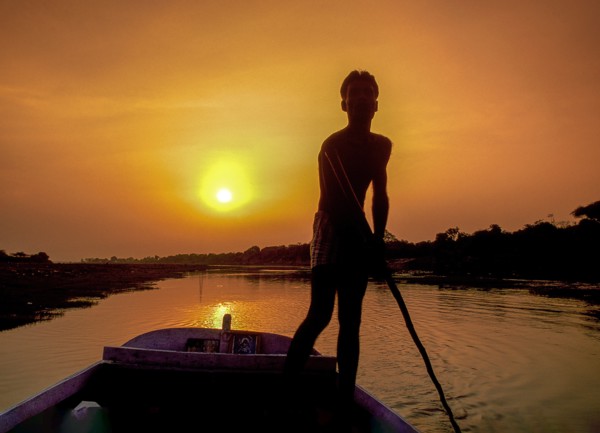 Boatman at sunset