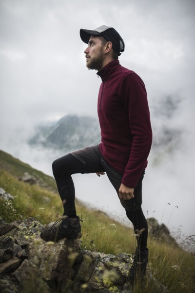 Young man hiking in Swiss Alps