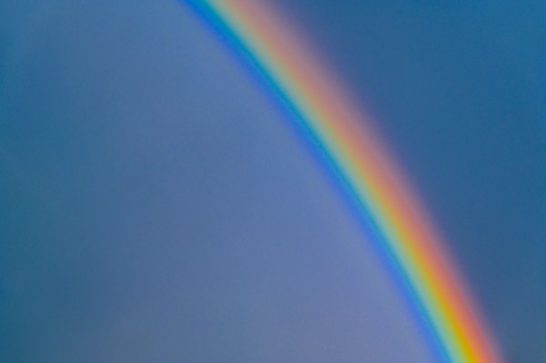 Rainbow on blue sky