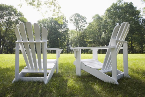 Adirondack chairs in backyard