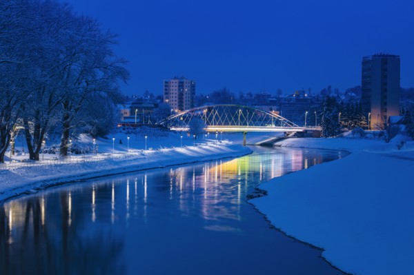 Poland, Subcarpathia, Rzeszow, Illuminated bridge at night in winter