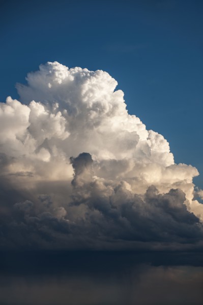 Cumulus storm clouds and rain