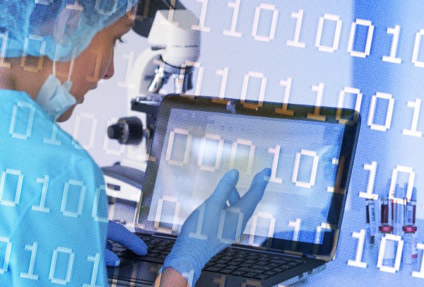 Medical professional video conferencing from laboratory with laptop