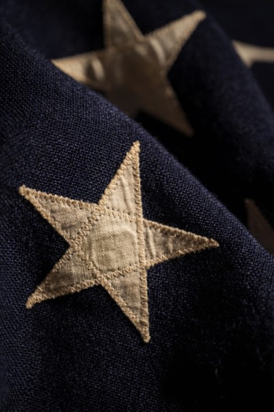 Close-up of star on retro American flag