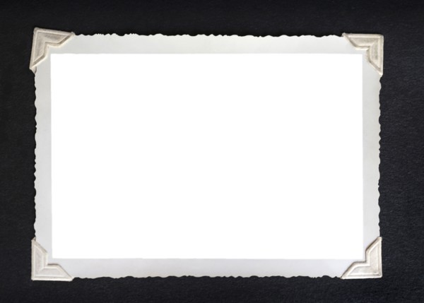 Retro picture with empty frame in photo album