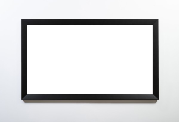 Empty black horizontal frame handing on white wall