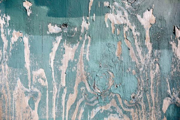 Close-up of peeling turquoise wood
