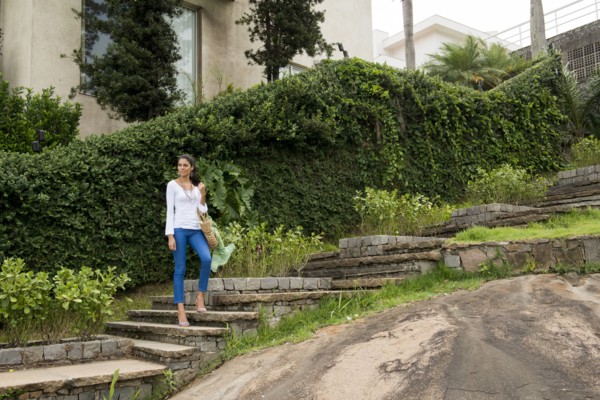 Woman standing on stone steps