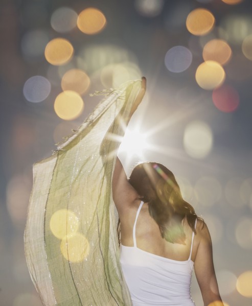 Caucasian woman waving scarf