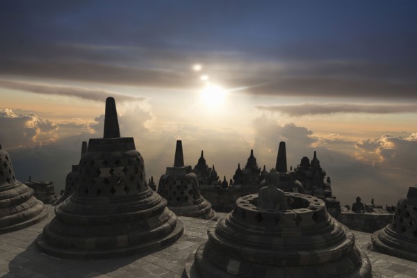 Spires on Temple of Borobudur at sunset