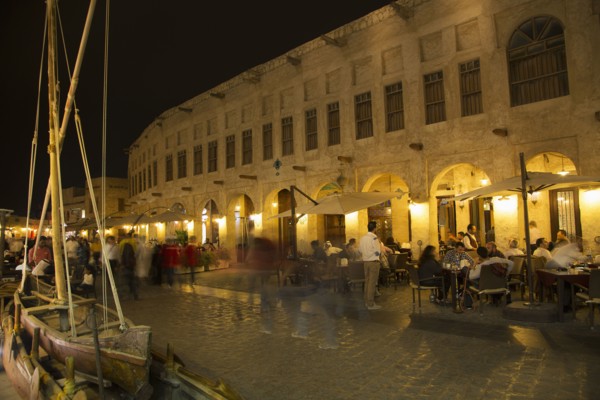 Blurred view of people shopping in outdoor market