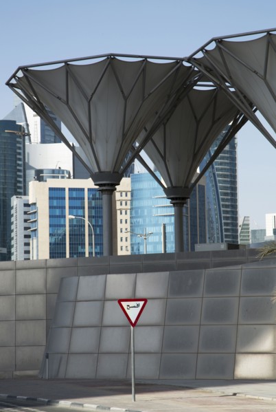Roadsign under unique structures in Doha cityscape