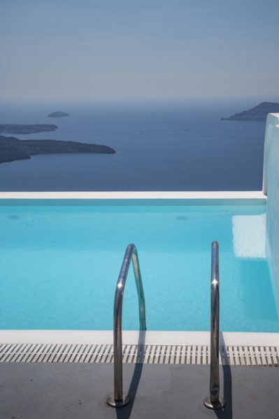 Swimming pool on hilltop over ocean
