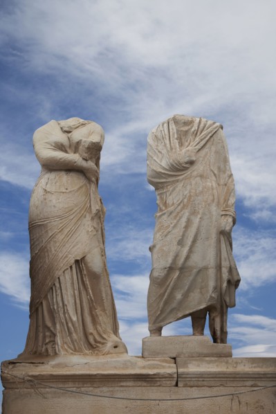 Low angle view of dilapidated statue ruins