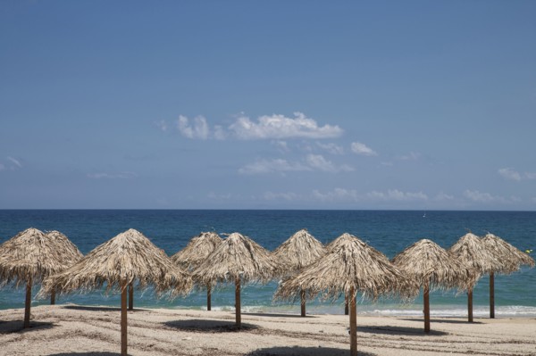 Thatch umbrellas on beach