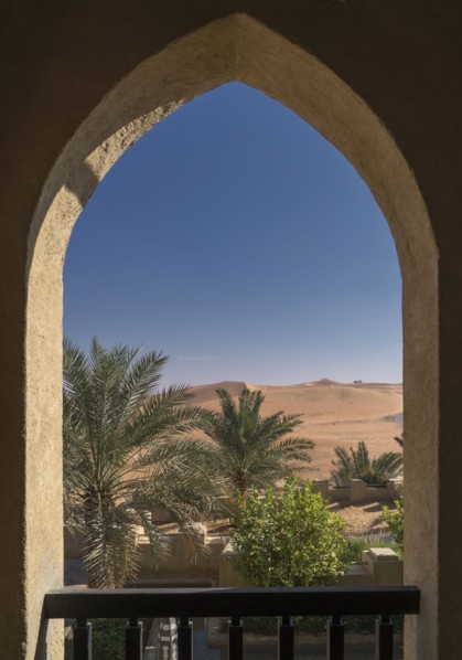 Scenic view of desert through arch